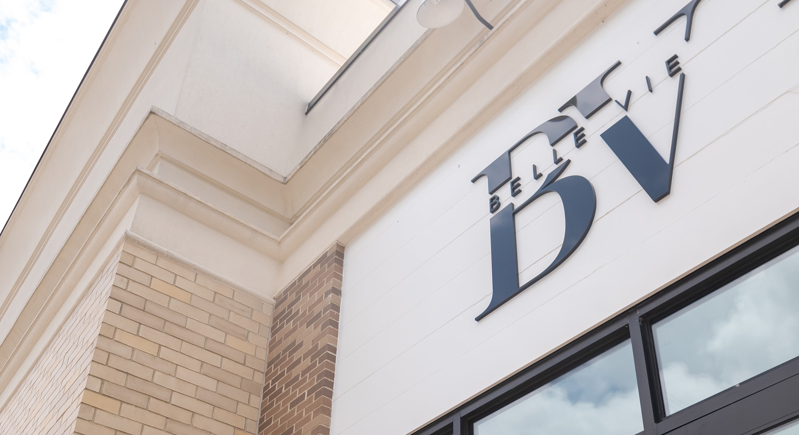 Storefront with signage for Bellevue DV.